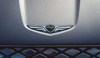 Genesis GV70 Electrified - Genesis badge